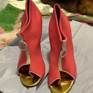 Christian Louboutin Hot Pink
and Gold Peep-Toe Heels